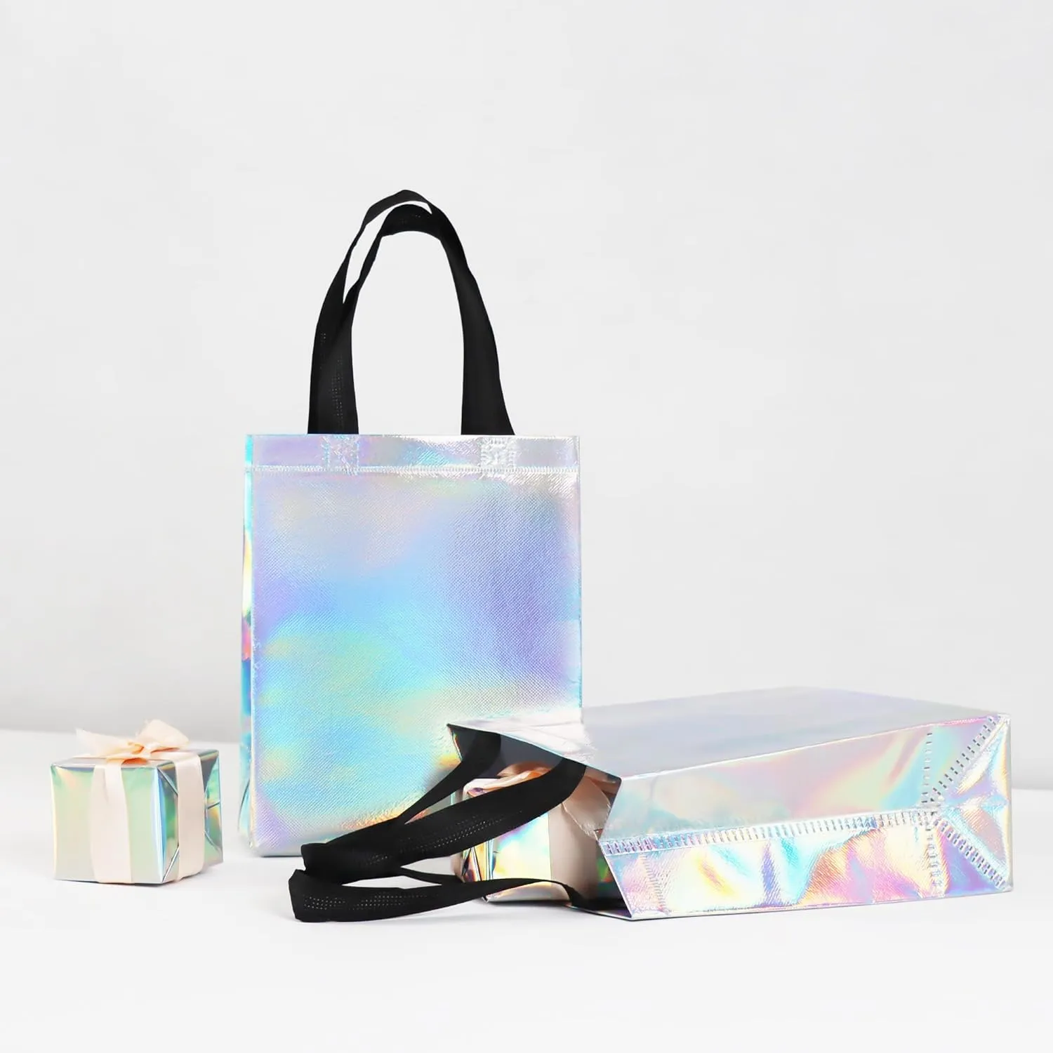 9 Pcs Glossy Small Iridescent Gift Bags in Bulk, 8x3.9x9.8 In Non-woven Reusable Party Bags with Sturdy Bases for Birthday, Weddings, Easter, Holiday, Party